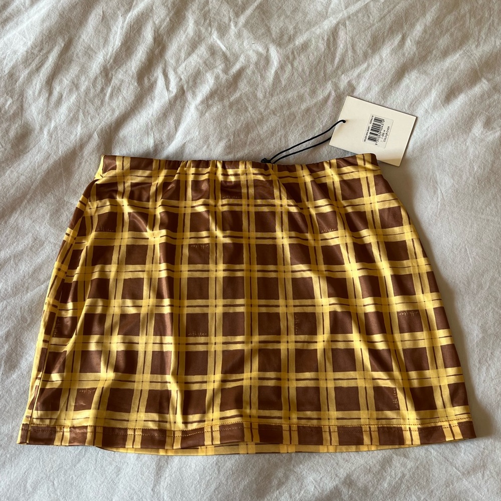 With Jean miles mini skirt in Cher